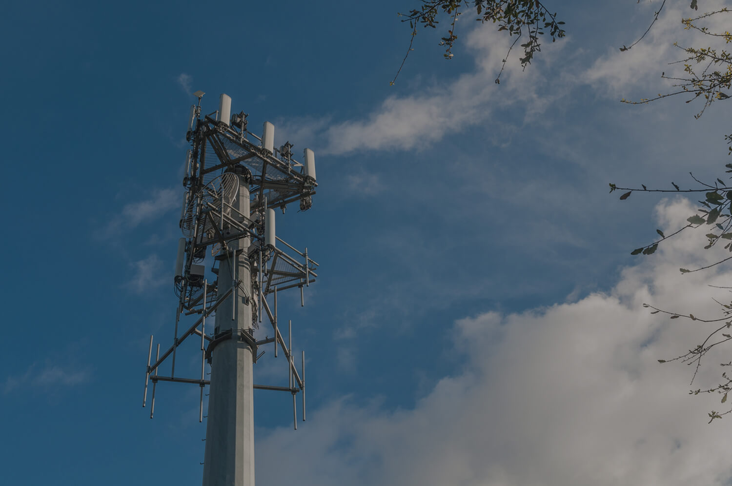 Cell tower with blue sky in the background