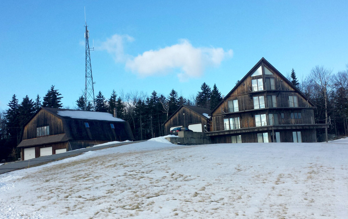 Vermont property in the winter with cell towers